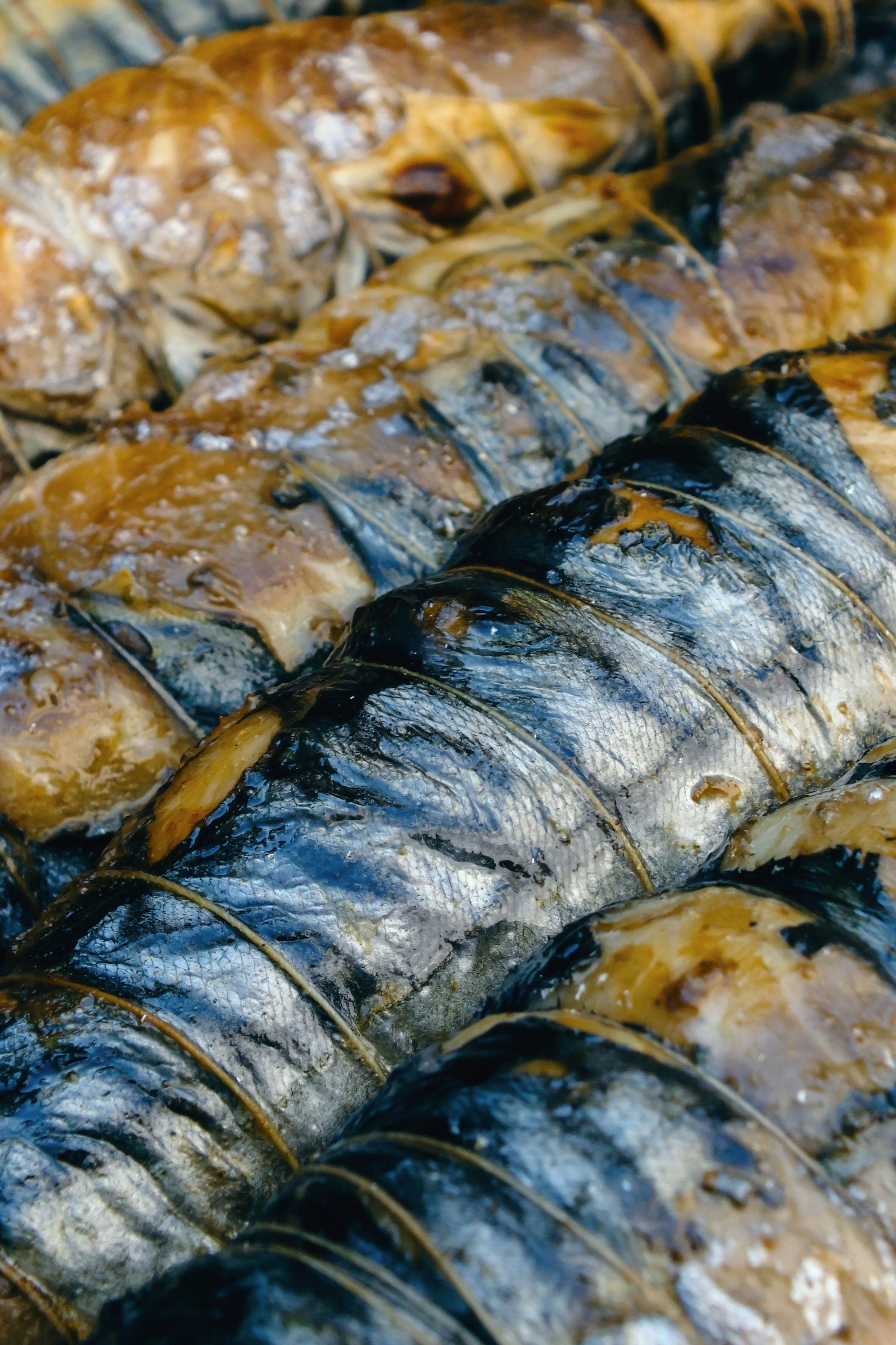 Fish being prepared for cooking.