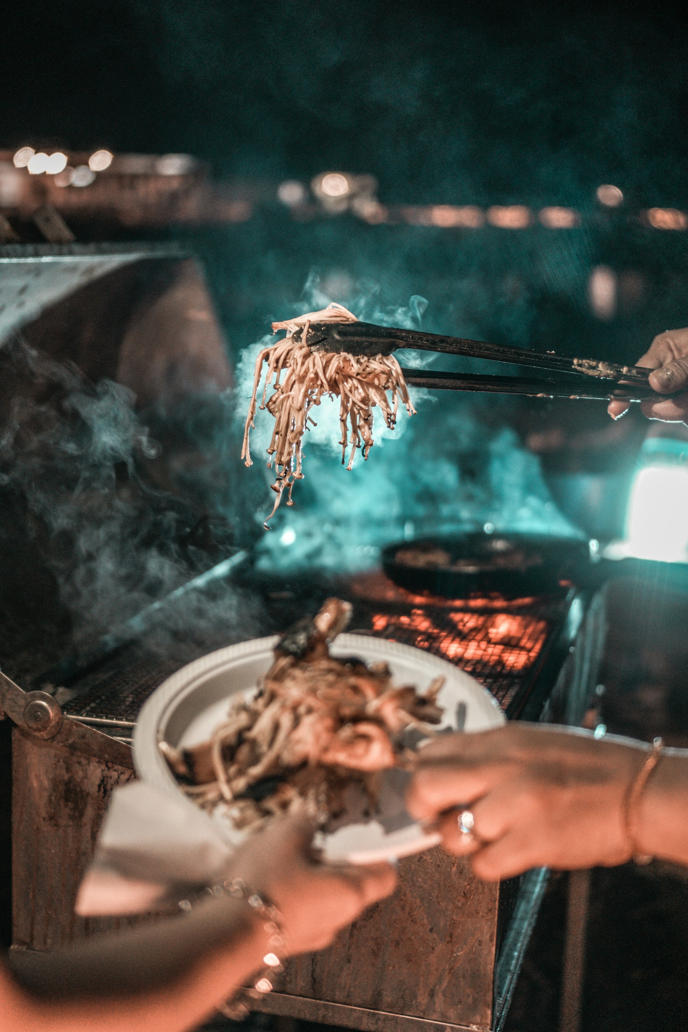 BBQ food being served on the beach.